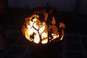 steel fire ball cowboy and horse design